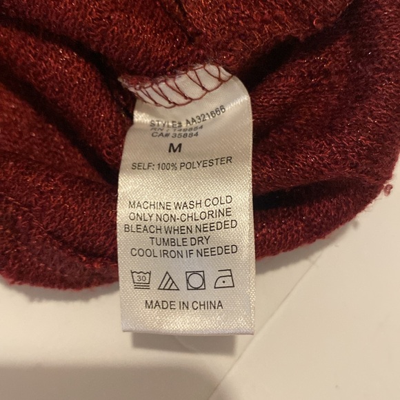 Dark cherry red shimmery Sadie & Sage knit top waist detail accentuates curves - Picture 5 of 7